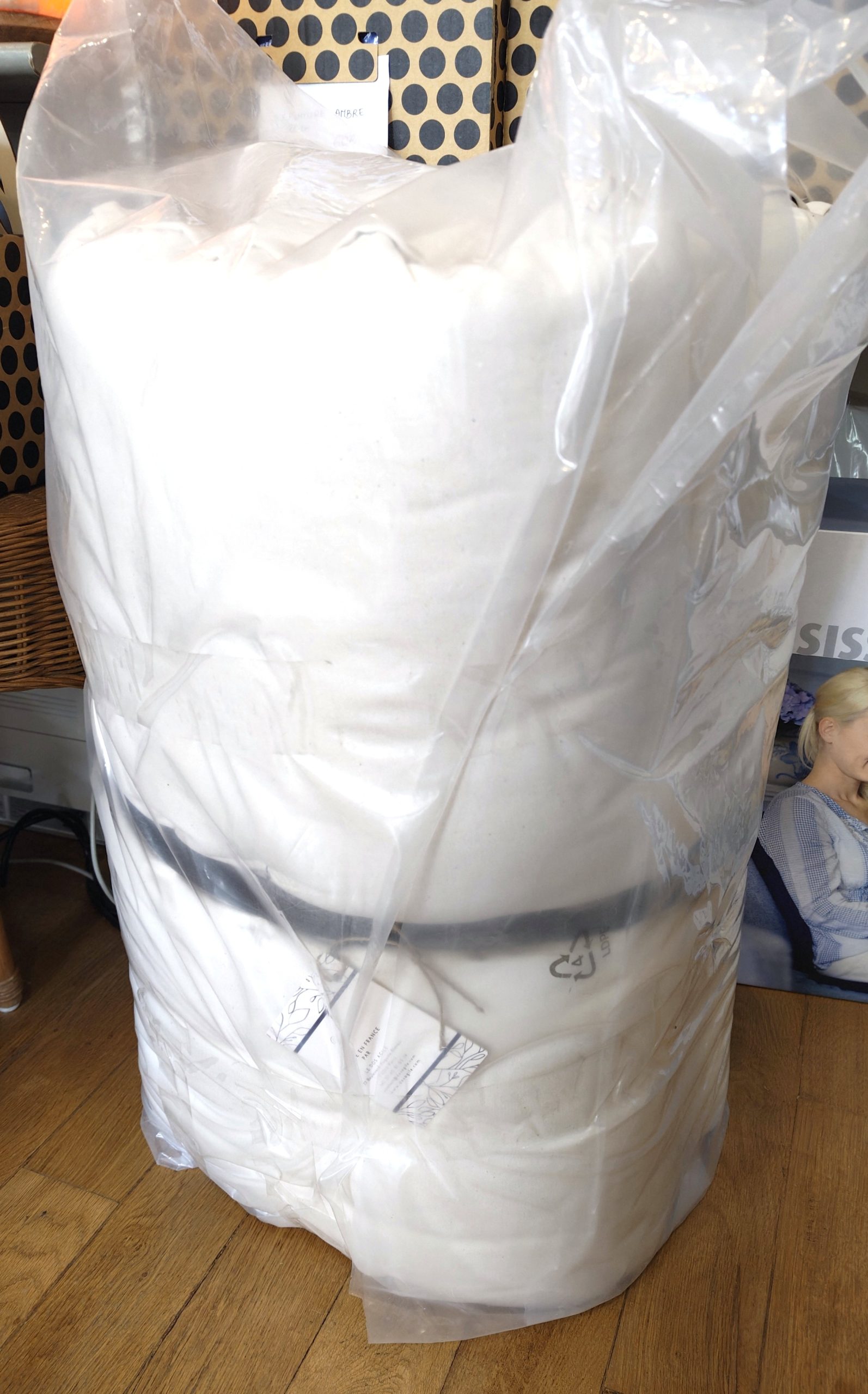 Futon de voyage avec sa sangle de maintien